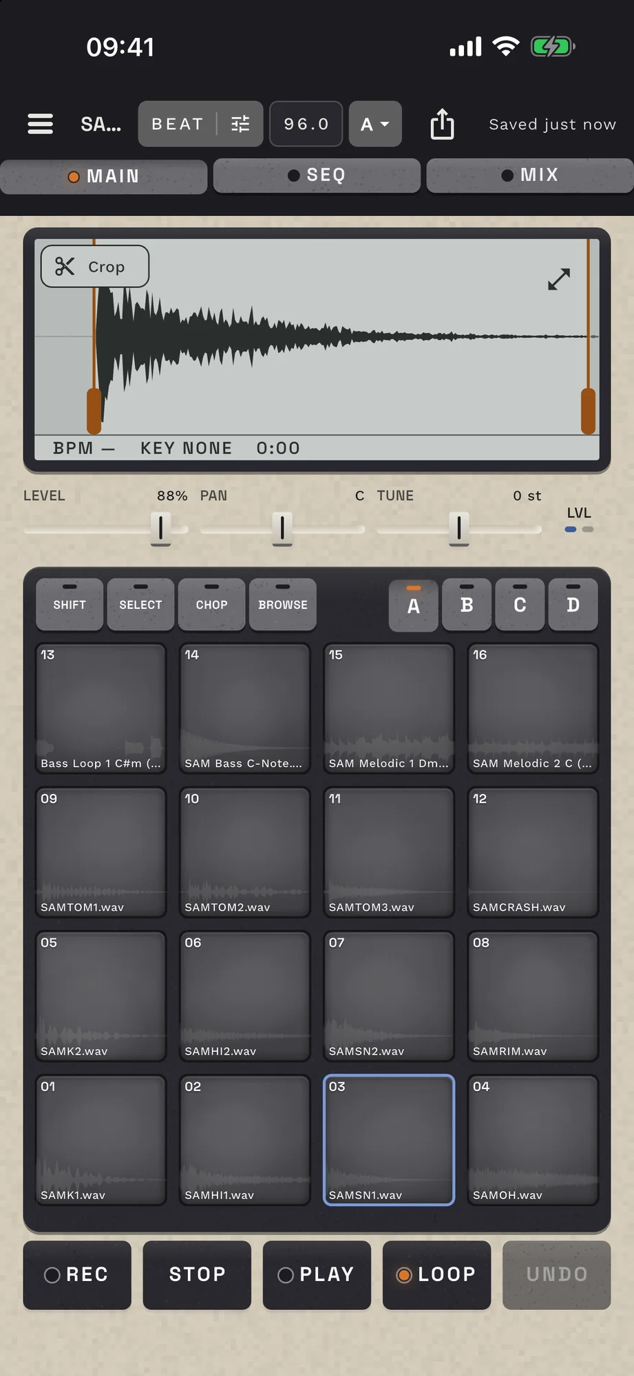 The same MAIN screen on iPhone: waveform, level, pan and tune, sixteen pads and the transport keys.